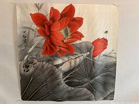 Full view of watercolour painting showing large red lotus flower, seed pod, and gray-green lotus leaves with Chinese signature.