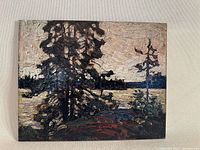 Front view of Tom Thomson recreated painting on panel showing the textured brush strokes, trees, and water scene.