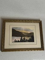 Full view of the framed print showing the artwork, matting, and frame.