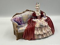 Full view of the figurine without size reference objects.