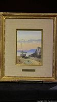 Full view of the framed watercolor painting 'Dry Dock' by Charles des Clayes showing the boat and landscape scene.