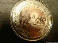 Obverse side of the coin showing The Last Supper scene with inscription and biblical reference.