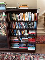 Front view of Gibbard bookcase with four shelves and books