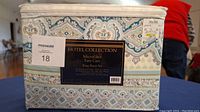 Packaged Hotel Collection Microfiber King Sheet Set with a visible label showing set details and material