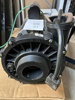 Front view of the pump intake showing Waterway branding and model information on the housing.