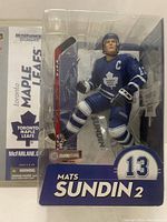 Front view of unopened McFarlane NHL Mats Sundin figure in sealed packaging showing player in blue Toronto Maple Leafs uniform, holding hockey stick.