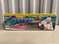 Front view of the sealed Upper Deck MVP 2022-23 box showing branding, product information and featured hockey player image.