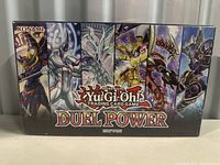 Front view of sealed Yu-Gi-Oh! Duel Power trading card box with character artwork