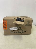 Box of EnviroLogic branded black garbage bags, shows damaged opening with visible bags inside
