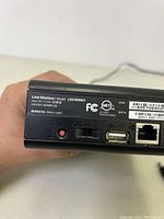 Rear panel view of Buffalo LinkStation LS210D0601 showing USB ports, function switch, network port, and model labeling.