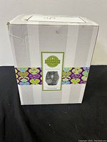 Closed original box with Scentsy Crystal Ice label, minor damage visible on box