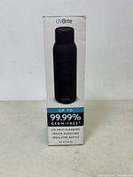 Front view of the UVBrite box showing black insulated water bottle image and product claims of 99.99% germ-free self-cleaning and water purifying features.