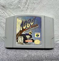 Front side of 1080° Snowboarding Nintendo 64 cartridge showing label with game title and artwork