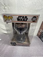 Front view of boxed Funko Pop Star Wars The Mandalorian with The Child #380 chrome vinyl figure showing packaging and figure details