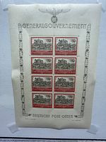 Full sheet of 8 stamps mounted on cream background with ornate border and eagle emblem.