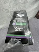 Front view of sealed Final Fantasy Type-0 trading card game starter set box showing product details and branding.