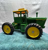 Left side view showing articulating joint and wheel tread