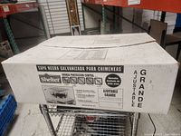 Closed box showing product and features on the label side, including brand, product type in Spanish, and protection features icons.