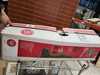 Box showing part of the branding and shipping details for the tree product box.