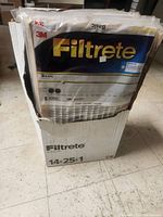 Box containing 21 3M Filtrete Basic 14x25x1 air cleaning filters in original packaging