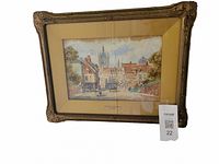 Framed watercolor painting titled Ypres The Menin Gate by T.E. Francis, showing a street scene with buildings and large gate in the background