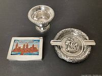 Three items overview: pedestal toothpick holder, trinket box, ornate ashtray
