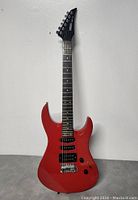 Front view of full red Yamaha RGX112 guitar