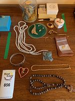 Wide shot of all jewelry items on table