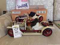 Model displayed with original box and Rest Easy tag.