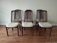 Overview of six chairs in front and back rows