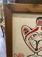 Close-up of the top left corner of the wooden frame and part of the painted image showing detailed brushwork and frame condition.