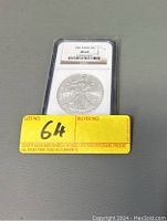 Front view of 2001 Silver Eagle coin in NGC slab showing MS 69 grade label and coin details.