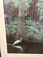 Close-up of the acrylic painting showing the white egret bird in water near trees and foliage.