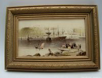 Front view of the framed glass porcelain image showing Quebec harbor scene with ships and figures, in ornate golden frame.