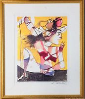 Full view of the framed abstract artwork featuring multiple stylized human forms in an overlapping design using yellow, red, white, purple, and black colors. Signature visible at bottom right.