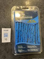 Front view of the new Dock Line rope in packaging showing product details, size and material.