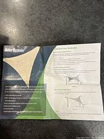 Installation instructions for AslerOutdoor shade sail showing product details and usage recommendations.