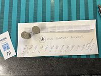 Photo of 26 old Canadian nickel coins envelope with years listed including 1923, 1942, 1946, 1957, 1954, 1967 Centennial and others