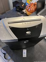 Top view of Auritron paper shredder showing slot and control switch