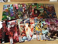 Lot of 20 high grade mix of Marvel, DC, and other comics, all visible in a neat spread