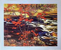 Front view of the art print "The Red Maple" by A.Y. Jackson showing vibrant red maple leaves by a river. White border with title, edition, and artist signature visible.