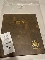 Brown Uni-Safe album cover with gold foil “CANADA CENTS Miscellaneous-Divers”