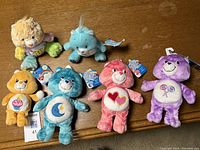 Overview of all six Care Bears, showing five with tags and one without.