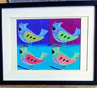 Framed print with colorful birds on divided background in purple, magenta, teal, and blue, signed Sherwood.