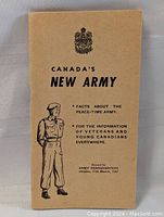 Front cover of the 1947 Canada military booklet "Canada's New Army" with crest emblem and soldier illustration.
