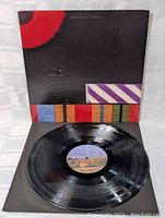 Vinyl record disc of Pink Floyd The Final Cut on label with soldier and memorial scene.