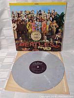 Front gatefold cover of Sgt. Pepper's Lonely Hearts Club Band album art