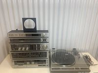 Front view of stacked components and separate turntable with dust cover