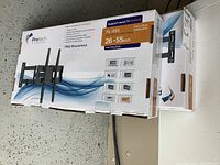 Two boxed Protech FL-555 TV mounts stacked, showing front side with model, screen size and features