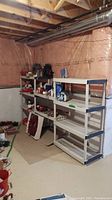 Shelving unit assembled from two connected plastic shelving units placed in a basement area with unfinished ceiling and walls.